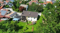 Luftaufnahme - Charmantes Zweifamilienhaus mit großzügigem Garten, Obergeschoss vermietet