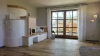 Wohnzimmer mit Grundofen