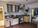 12 Küche - Charmantes Einfamilienhaus mit großem Grundstück, Gartenidylle und Ausbaupotenzial