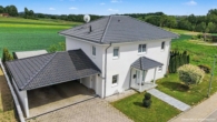 Außenansicht - Wo Familienträume Wurzeln schlagen: Modernes Wohlfühldomizil mit Panoramablick ins Grüne