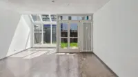 Wohnzimmer mit Wintergarten