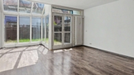 Wohnzimmer mit Wintergarten - Familienglück in sonnigen Räumen – Gepflegtes Reihenmittelhaus mit Wintergarten und Garten