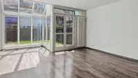 Wohnzimmer mit Wintergarten