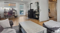 Wohnzimmer mit Zugang zur Terrasse EG