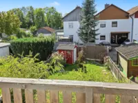Blick vom Balkon in Garten