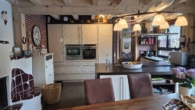 Essen Blick zur Küche - Bezauberndes Niedrigenergie-Holzhaus mit Pool