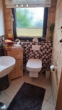 Gäste WC EG - Bezauberndes Niedrigenergie-Holzhaus mit Pool